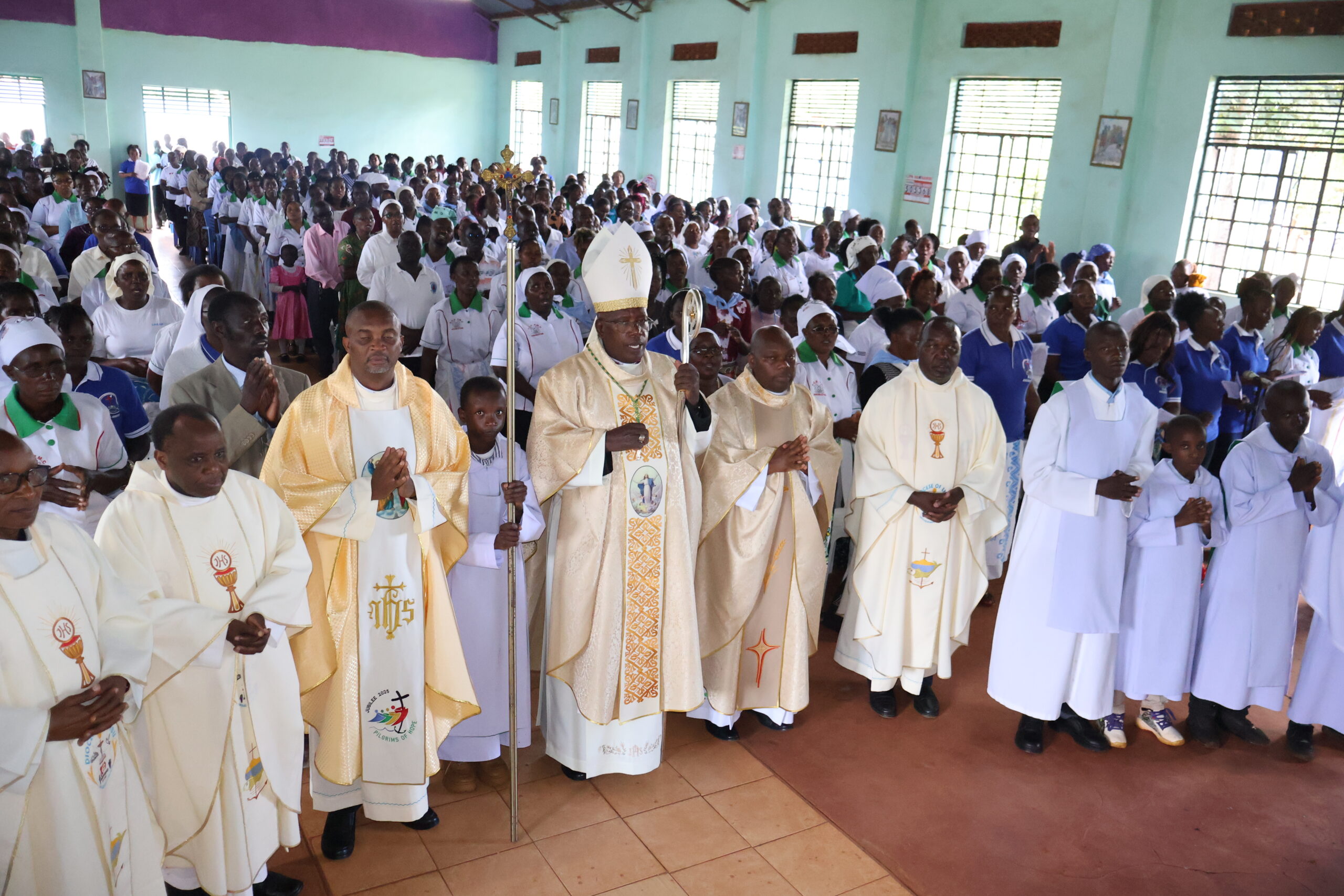 Diocese of Embu Bishop, Rt. Rev. Peter Kimani Ndung'u in a group photo with PMC animators during their Commissioning Mass at St. Mary's Makutano parish on 2nd May 2026
